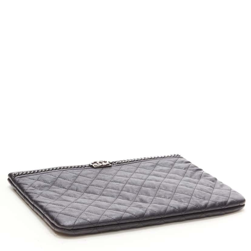 Chanel O Case Black Leather Never worn - Model View