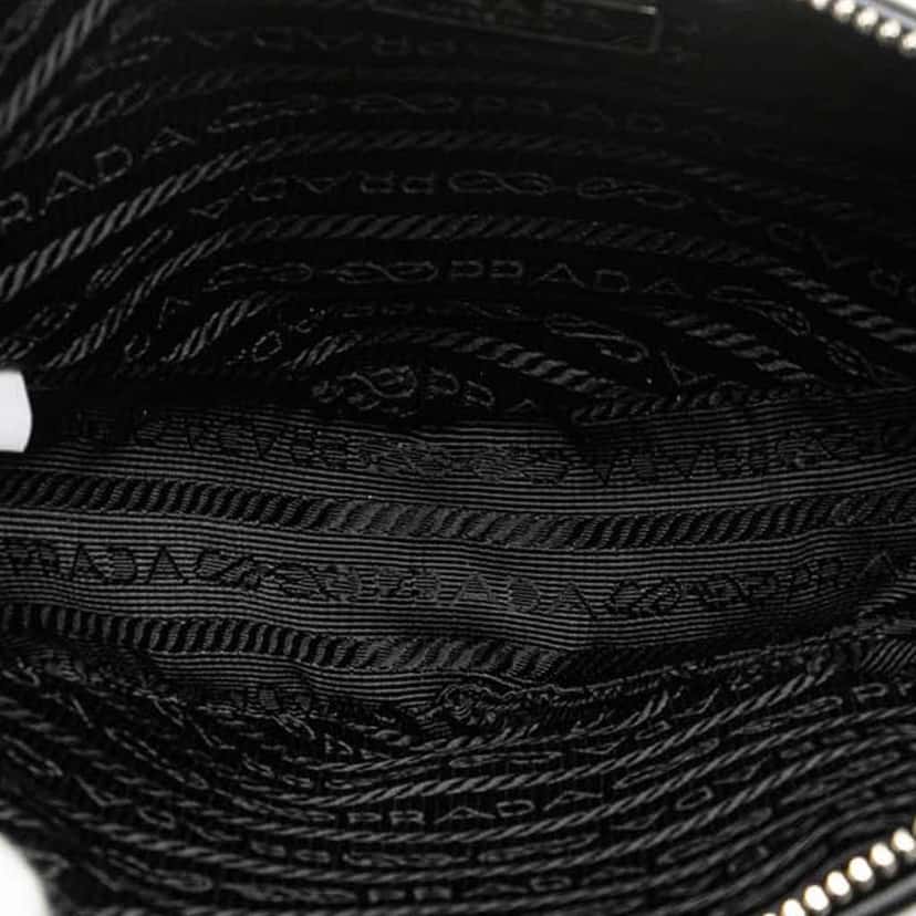 Prada Grace Lux Triangle Logo Embossed Triangle Wristlet Pouch Black Leather Good condition - Model View