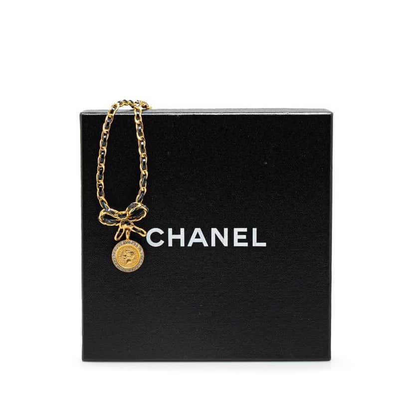 Chanel Leather and Gold Plated Medallion Bow Pendant Necklace Gold Metal Good condition - Box View