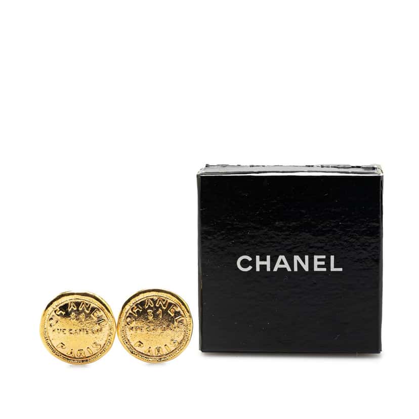Chanel Gold Plated Rue Cambon Round Clip on Earrings Gold Metal Good condition - Model View
