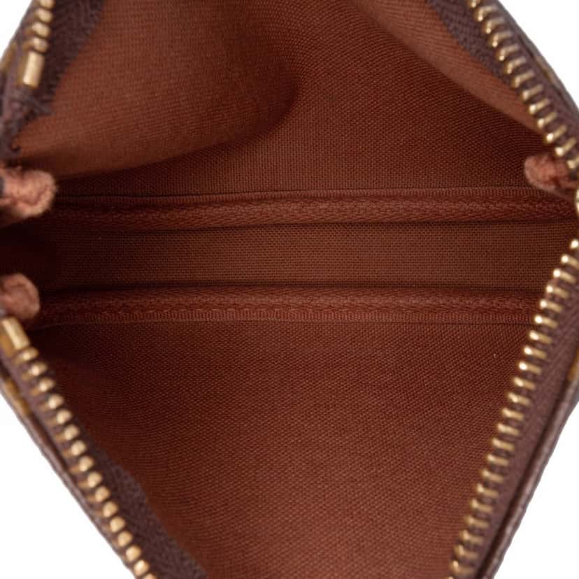 Louis Vuitton Monogram Giraffe Christmas Mini Pochette Accessoires Brown Canvas Good condition - Model View