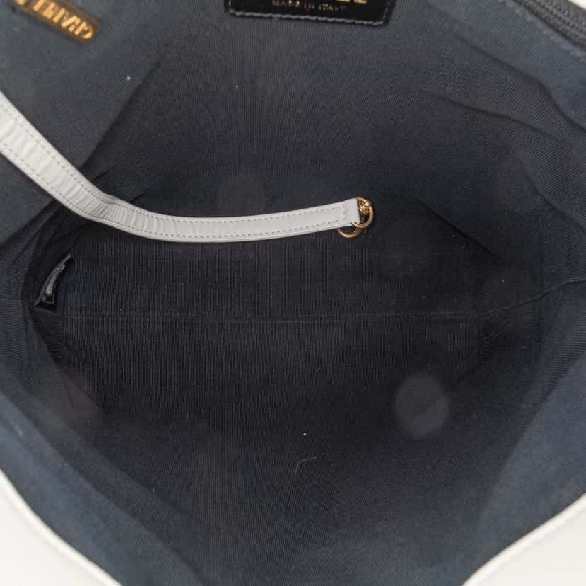 Chanel Quilted Calfskin CC Lock Chain Shopping Tote White Leather Good condition - Model View