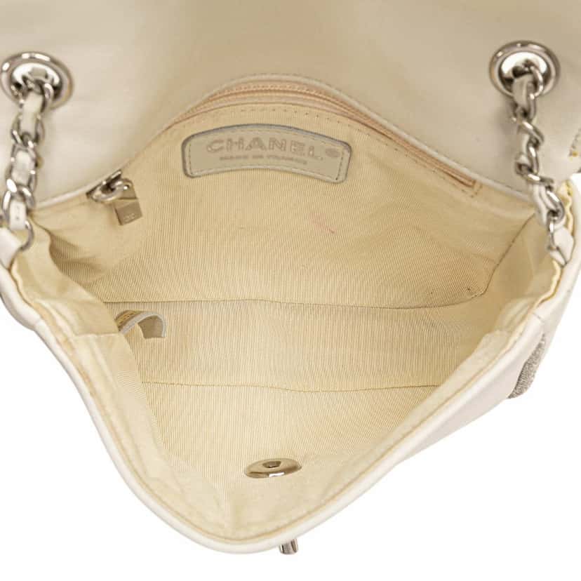 Chanel Mini Quilted Lambskin and Metallic Trim Elementary Chic Flap White Leather Good condition - Model View