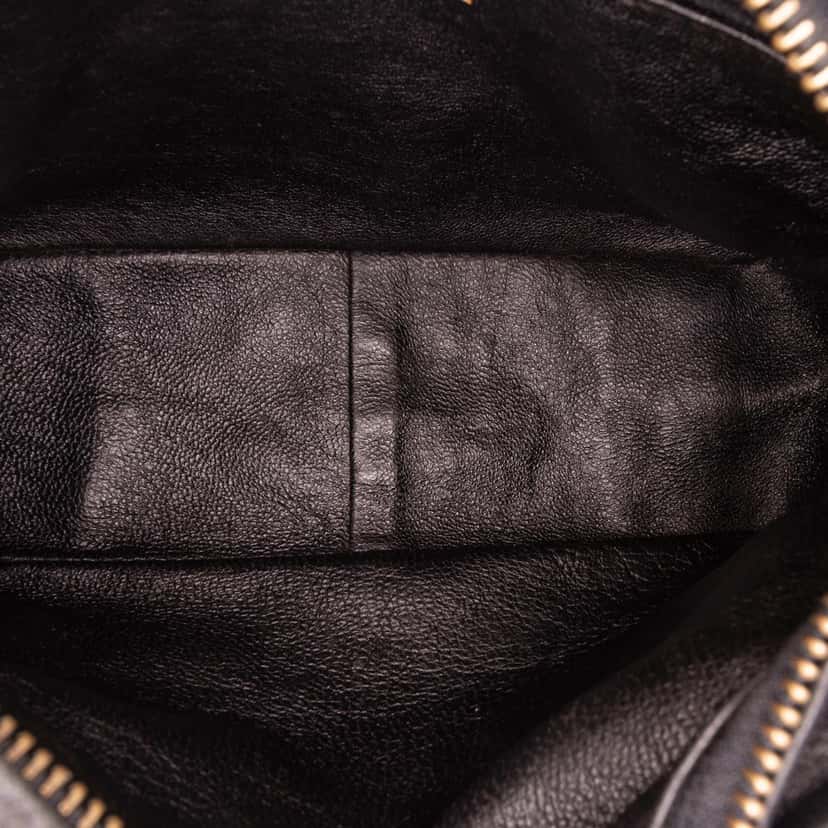 Chanel Mini Quilted Lambskin Camera Crossbody Black Leather Good condition - Model View