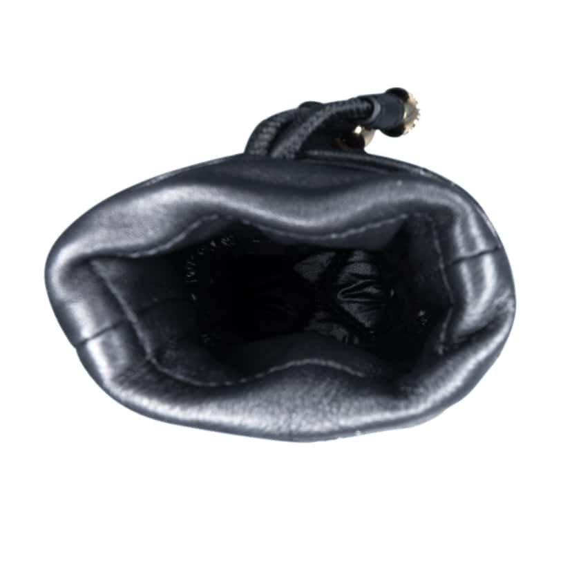 Chanel Micro Quilted Lambskin Drawstring Bucket Bag Black Leather Good condition - Model View