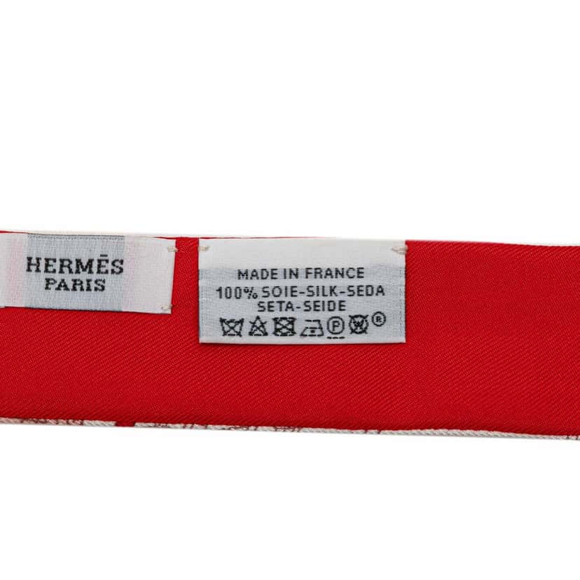 Hermès Le Tour Du Monde  Twilly Silk Scarf Red Silk Very good condition - Model View