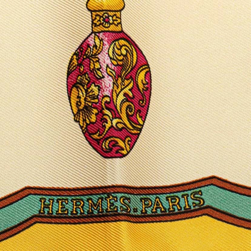Hermès Qu'Importe Le Flacon Silk Scarf Yellow Silk Good condition - Model View