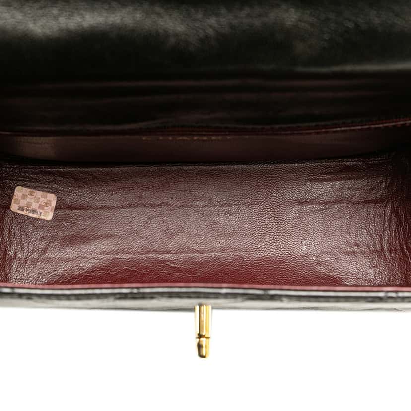 Chanel CC Quilted Lambskin Chain Flap Black Leather Very good condition - Model View
