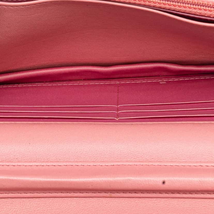 Chanel Embossed Lambskin Camellia Wallet On Chain Pink Leather Good condition - Model View