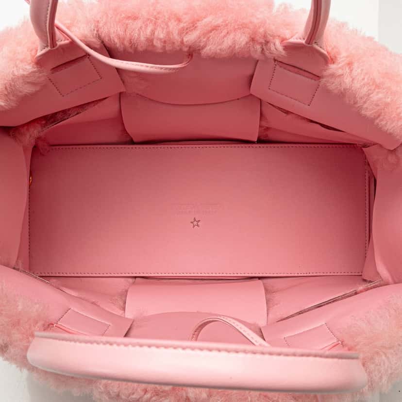 Bottega Veneta Small Shearling Intrecciato Arco Tote Pink Good condition - Model View