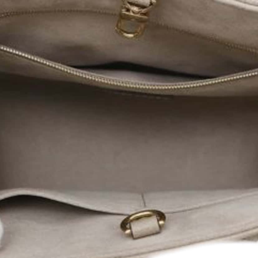 Louis Vuitton Bicolor Monogram Empreinte Giant OnTheGo PM Brown Leather Good condition - Model View