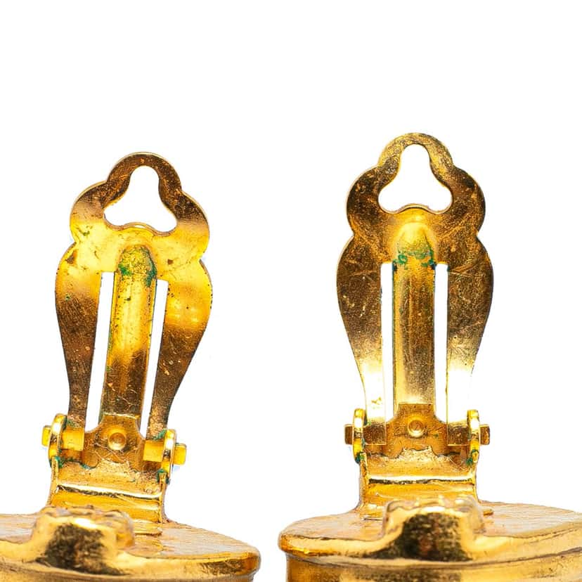 Chanel Gold Plated CC Rhombus Clip on Earrings Gold Metal Good condition - Model View