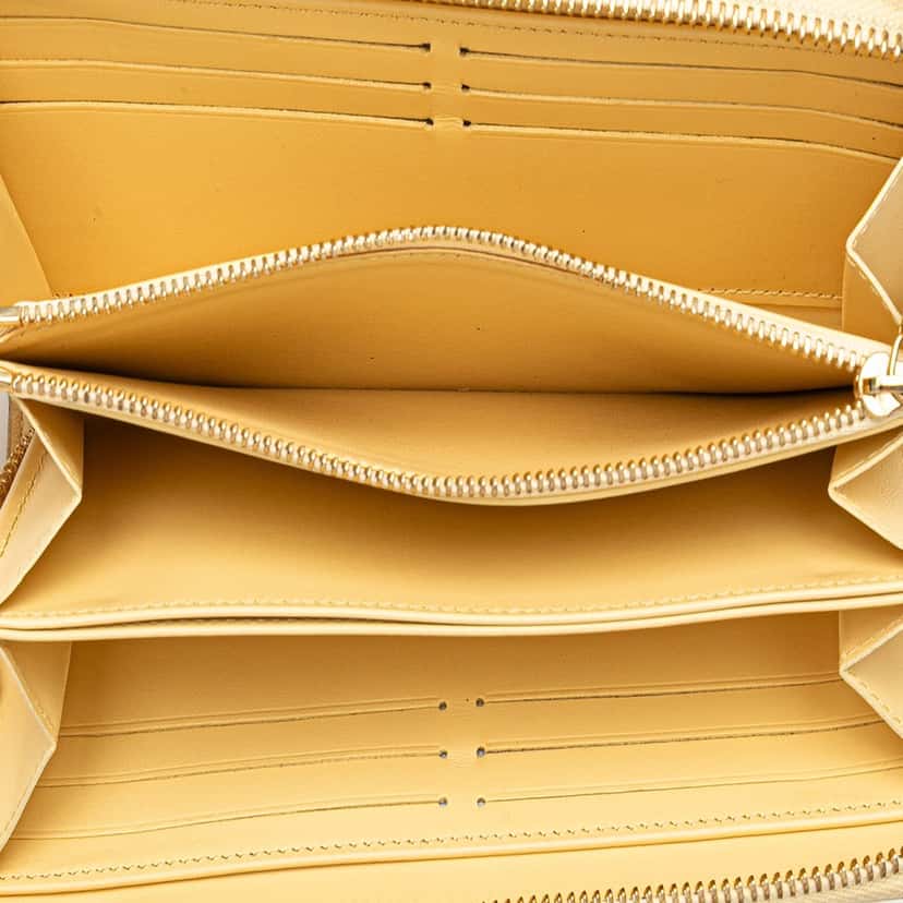 Louis Vuitton Embossed Calfskin Nanogram Zippy Wallet Yellow Leather Good condition - Model View