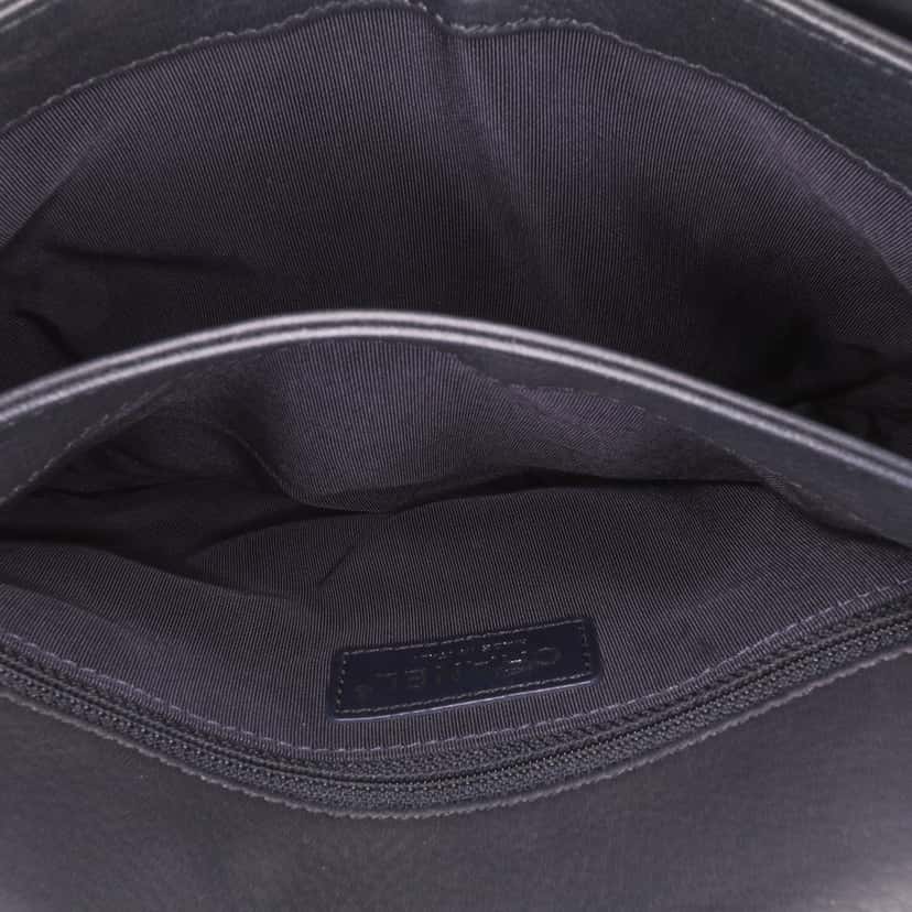 Chanel Small Quilted Grained Calfskin CC Round Clasp Accordion Flap Black Leather Good condition - Model View