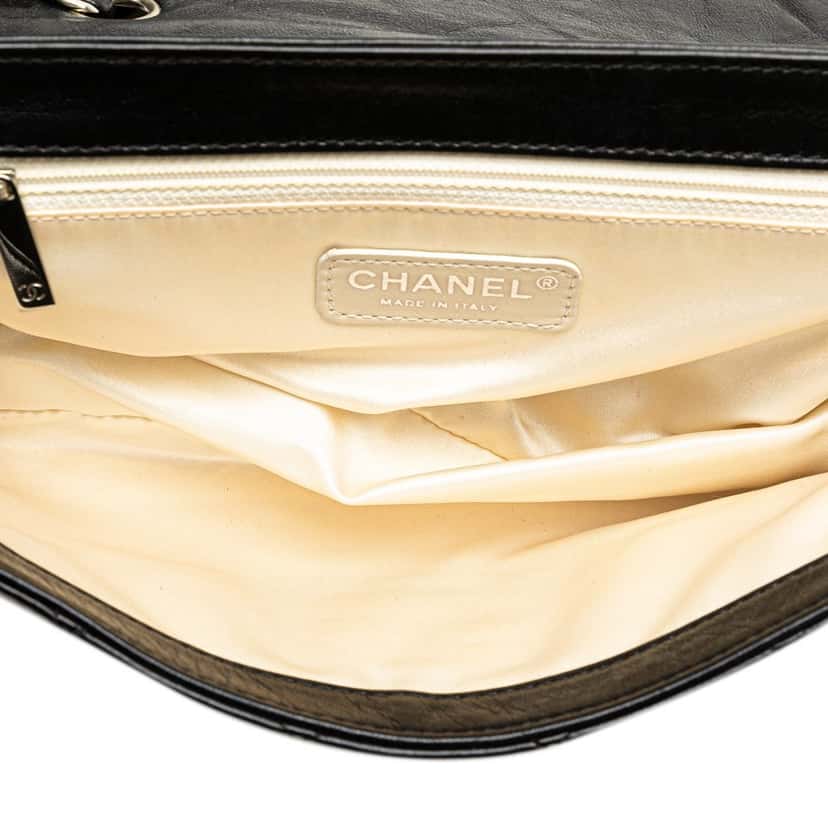 Chanel Quilted Lambskin Reissue East West Flap Black Leather Good condition - Model View