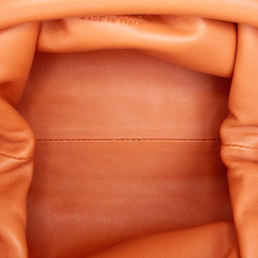 Bottega Veneta Lambskin The Mini Pouch Crossbody Orange Leather Good condition - Model View