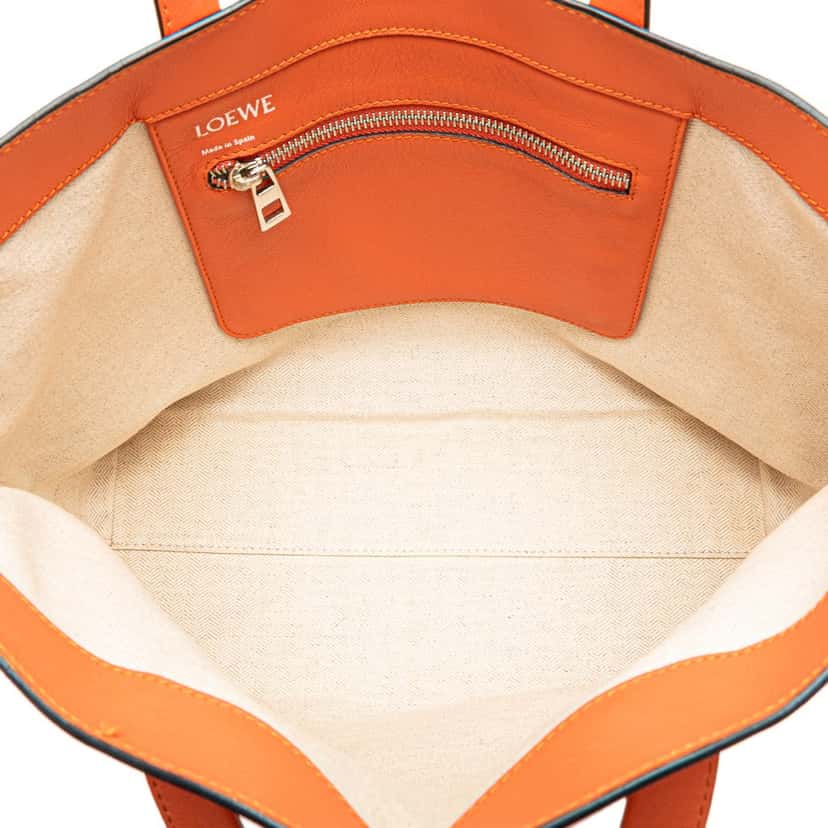 Loewe Anagram Leather East West Tote Orange Leather Good condition - Model View