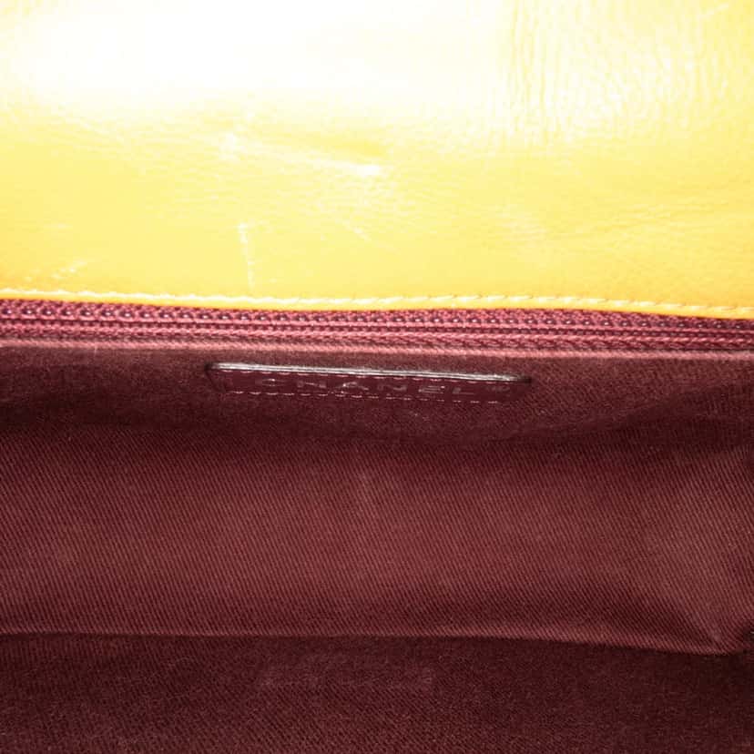 Chanel Small Quilted Iridescent Calfskin and Caviar Daily Carry Flap Orange Leather Good condition - Model View