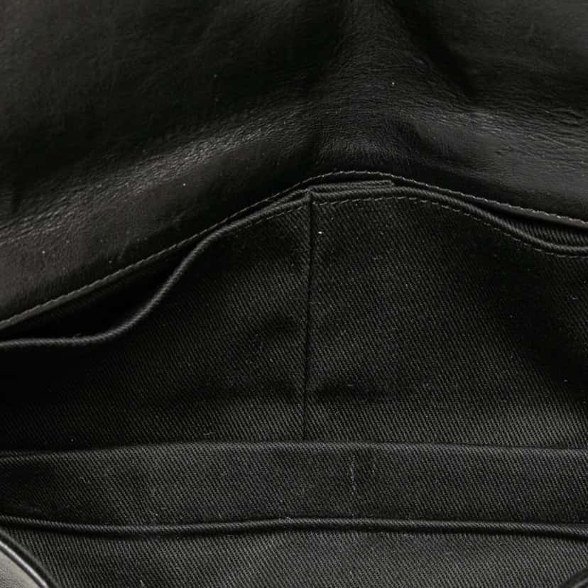 Chanel Quilted Calfskin Star Attitude Grommet Fold Over Clutch Black Leather Good condition - Model View