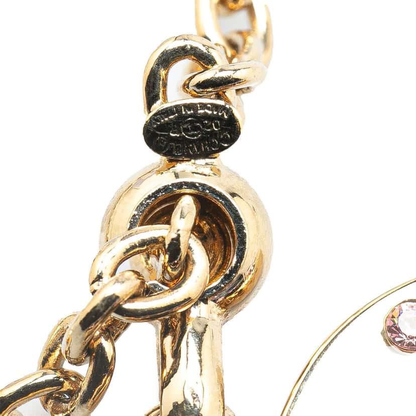 Chanel Gold Plated Rhinestone CC Heart Charm Gold Metal Good condition - Model View