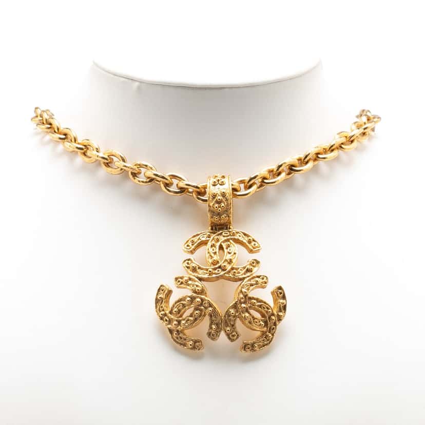 Chanel Gold Plated Triple CC Pendant Necklace Gold Metal Good condition - Model View