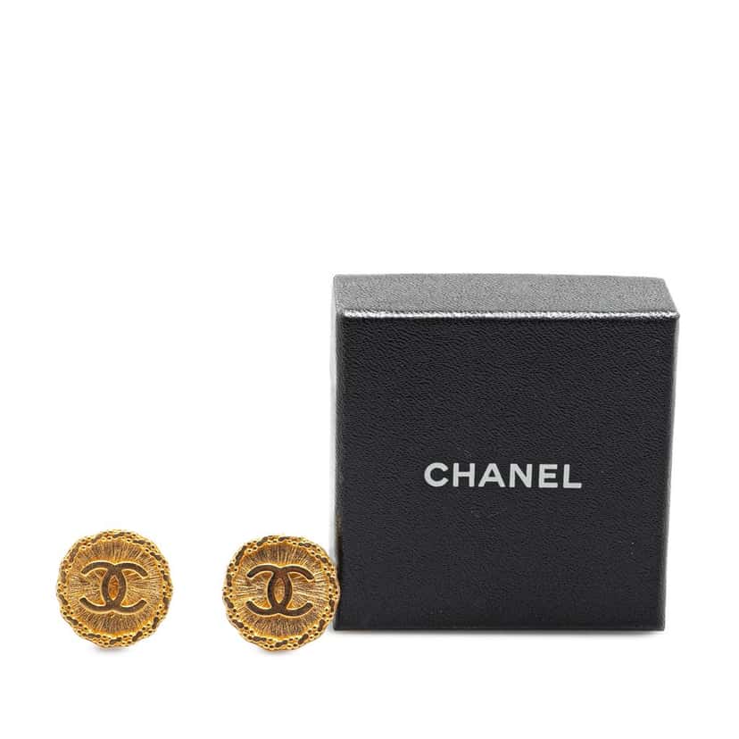 Chanel Gold Plated CC Starburst Clip On Earrings Gold Metal Good condition - Model View