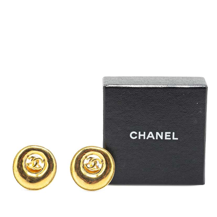 Chanel Gold Plated CC Round Button Clip On Earrings Gold Metal Good condition - Model View