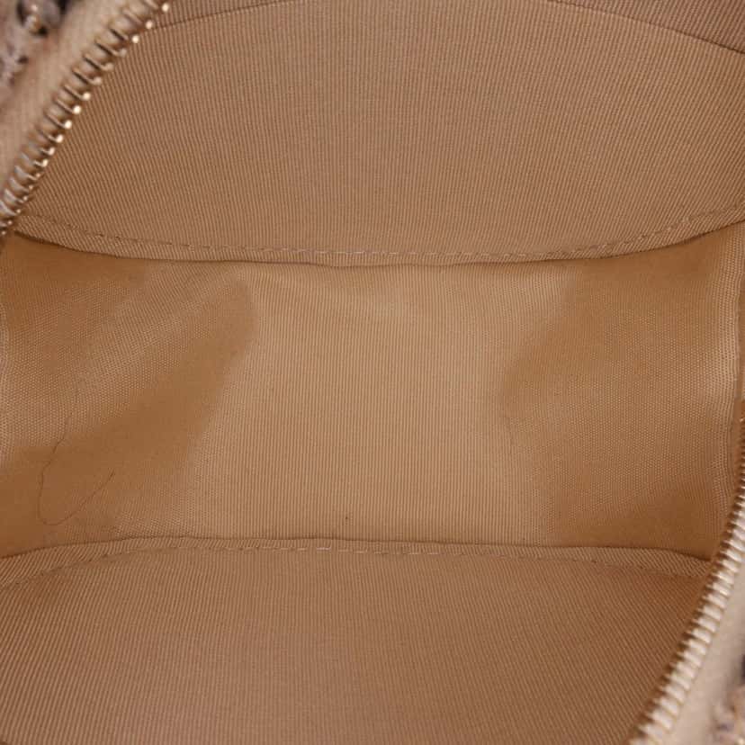 Chanel CC Quilted Tweed and Shearling Round Clutch With Chain Brown Tweed Good condition - Model View