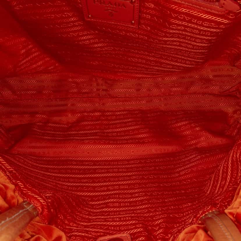 Prada Tessuto Logo Drawstring Tote Orange Good condition - Model View