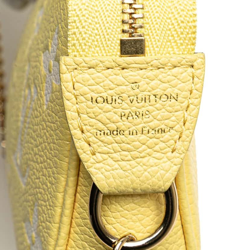 Louis Vuitton Bicolor Monogram Empreinte Mini Pochette Accessoires Yellow Leather Good condition - Box View