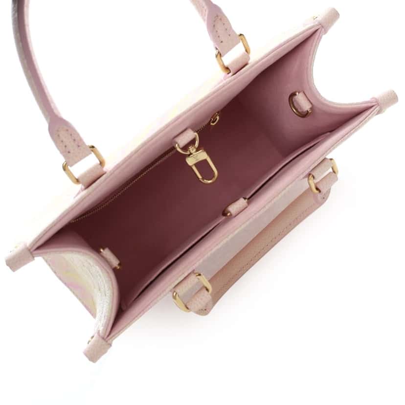 Louis Vuitton Monogram Empreinte Summer Stardust OnTheGo PM Pink Leather Good condition - Model View