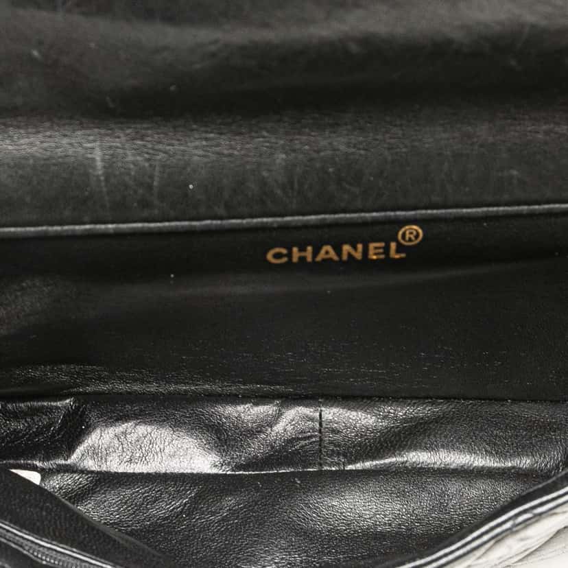 Chanel Medium Quilted Lambskin Double Sided Flap Black Leather Good condition - Model View
