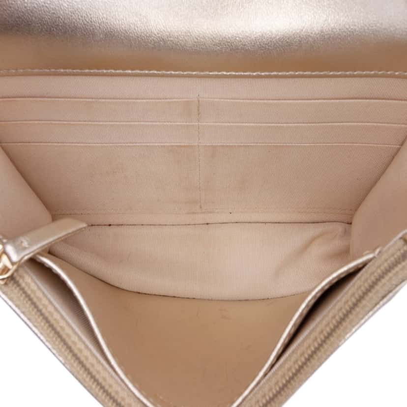 Chanel CC Metallic Quilted Lambskin Wallet on Chain Gold Leather Good condition - Model View