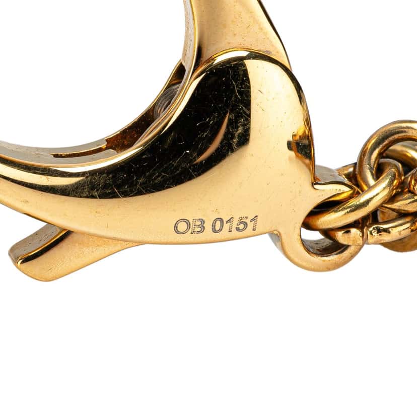 Louis Vuitton Gold Plated And Resin Insolence Bag Charm Brown Good condition - Model View
