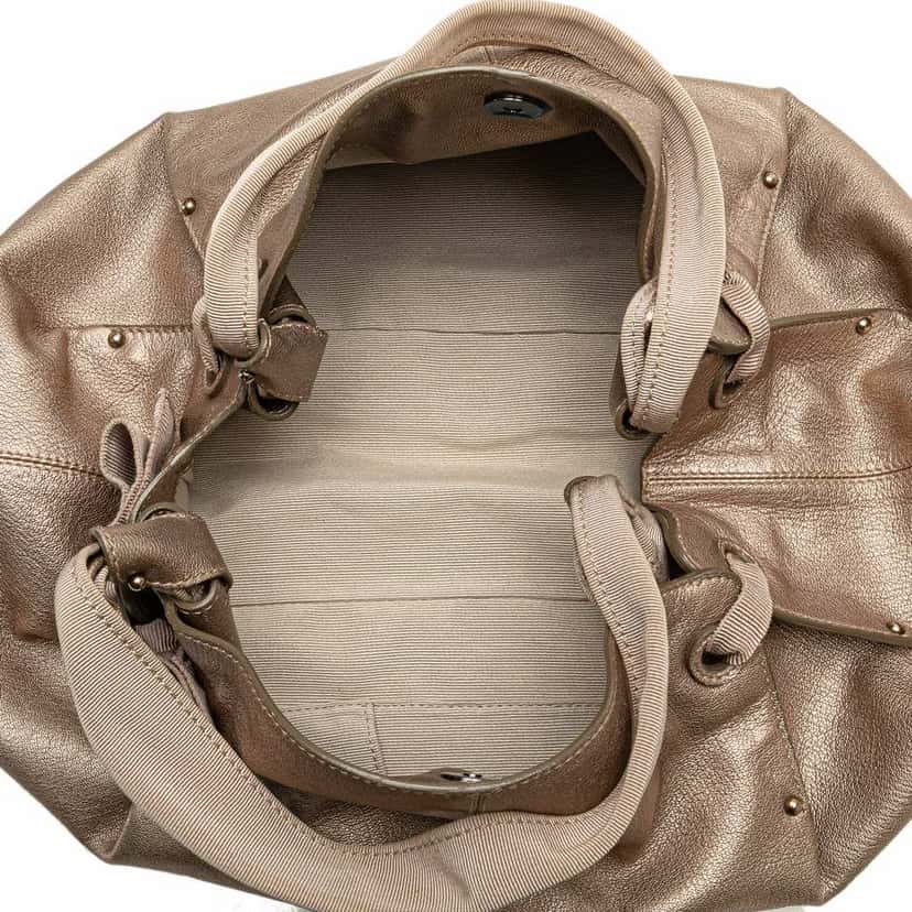 Salvatore Ferragamo Metallic Leather Bow Hobo Gold Leather Good condition - Model View
