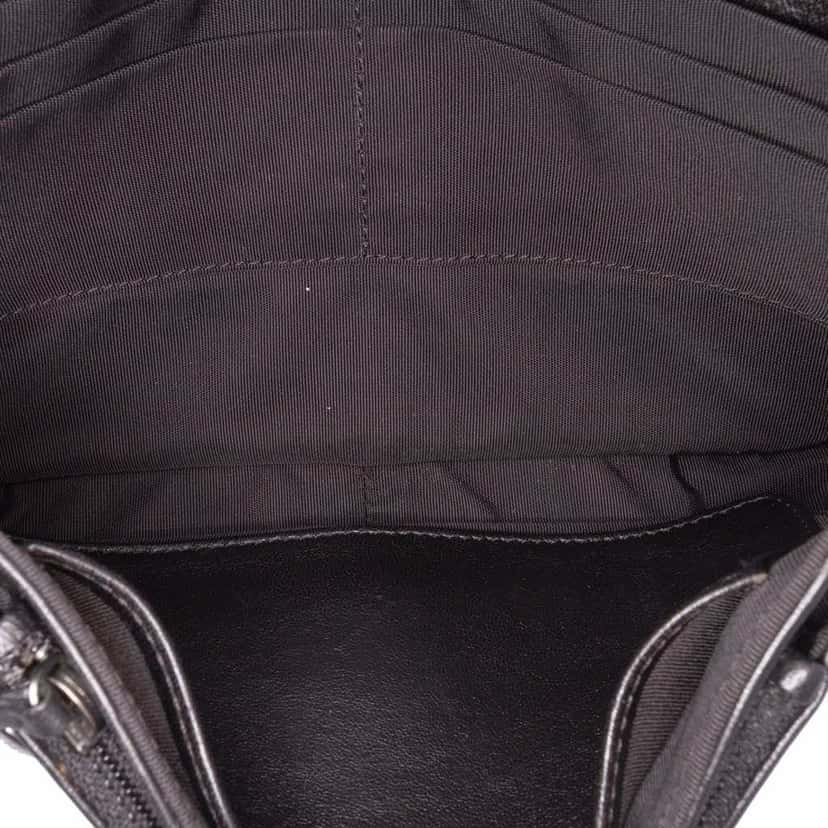 Chanel CC Quilted Lambskin Full Flap Wallet on Chain Black Leather Good condition - Model View