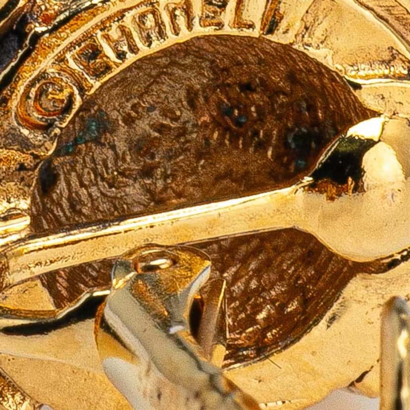 Chanel Gold Plated CC Round Clip on Earrings Gold Metal Good condition - Model View
