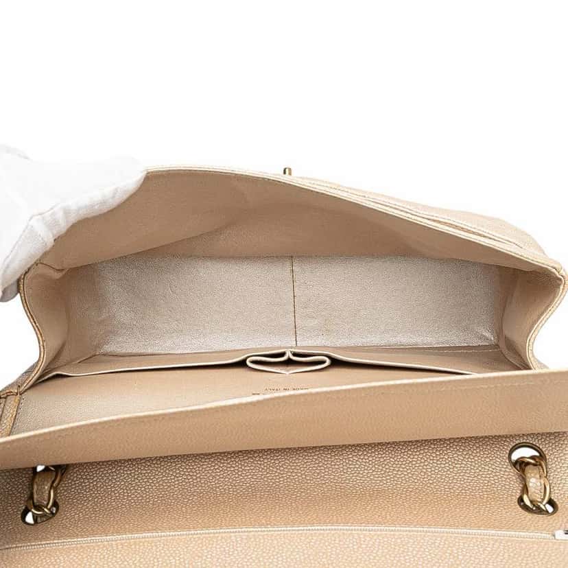 Chanel Jumbo Classic Iridescent Caviar Double Flap Gold Leather Good condition - Model View