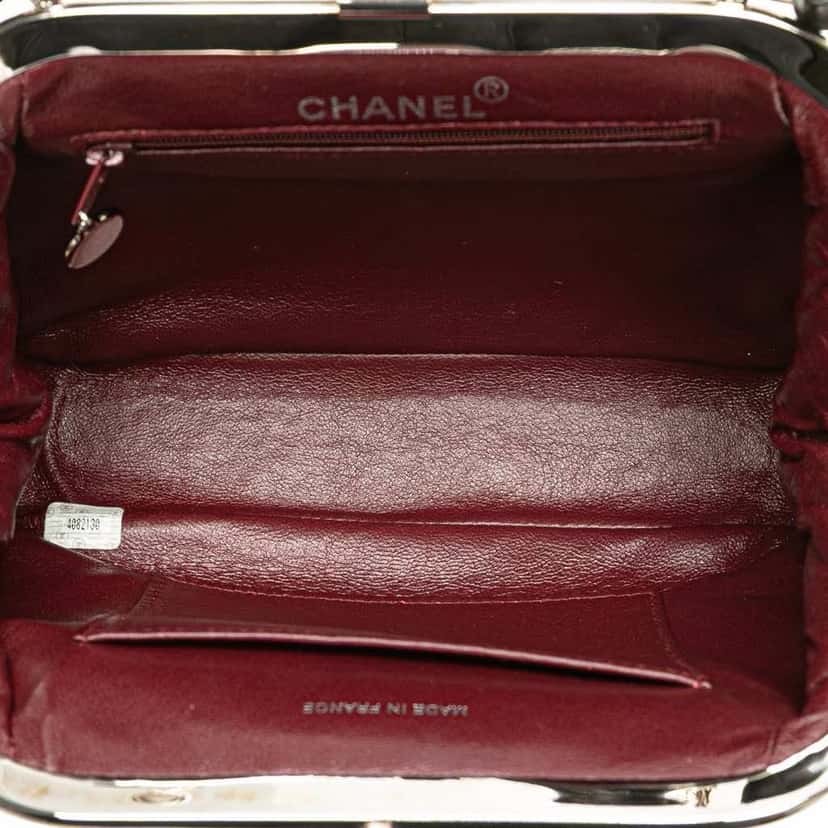 Chanel CC Quilted Lambskin Kiss Lock Frame Top Handle Bag Black Leather Good condition - Model View