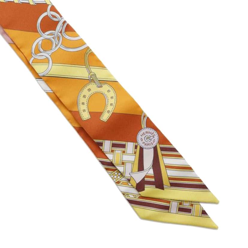 Hermès Brides et Gris-Gris Silk Twilly Scarf Orange Silk Very good condition - Model View