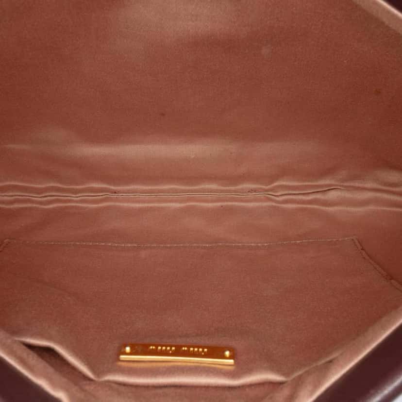 Miu Miu Leather Studded Frame Clutch Brown Leather Good condition - Model View