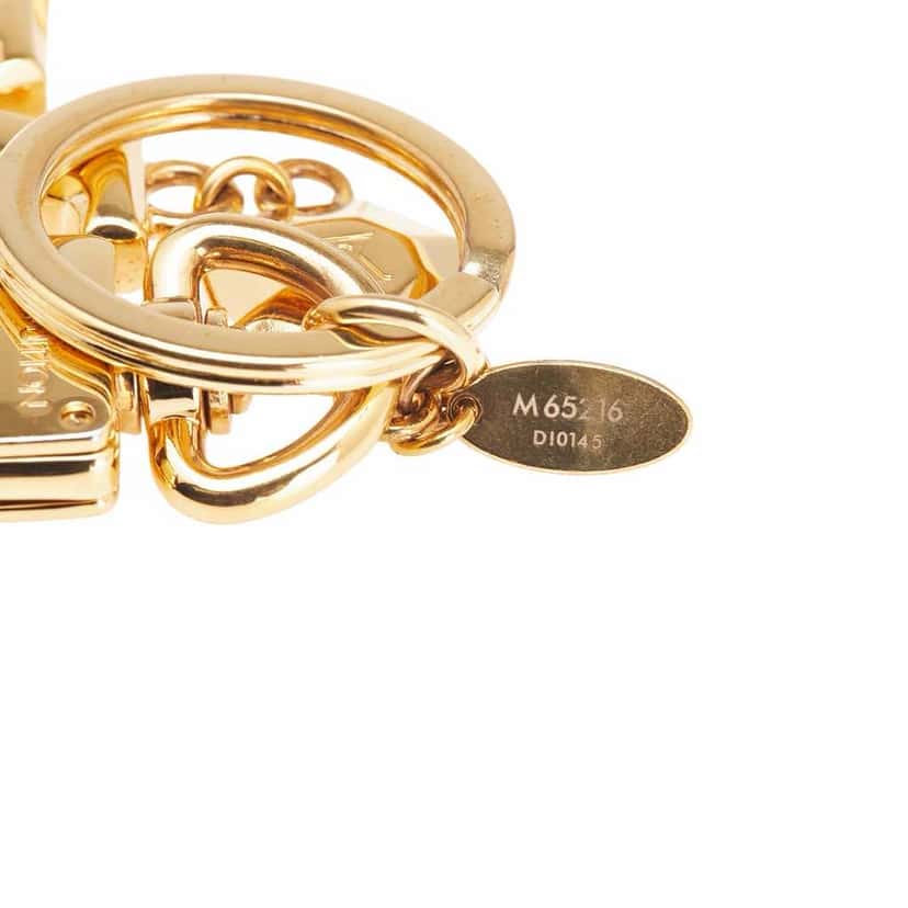 Louis Vuitton Gold Plated LV Facettes Bag Charm and Key Holder Gold Metal Good condition - Inside View