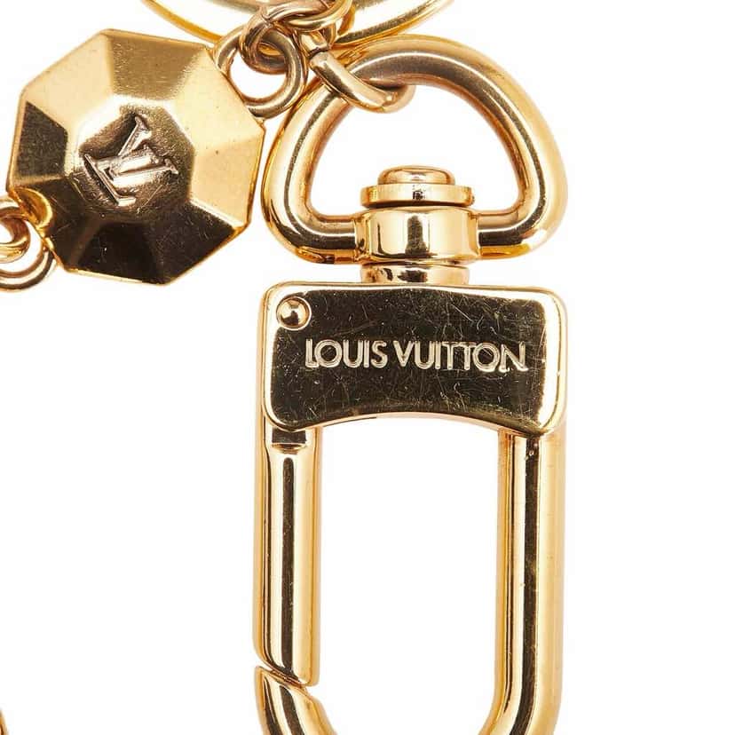 Louis Vuitton Gold Plated LV Facettes Bag Charm and Key Holder Gold Metal Good condition - Model View
