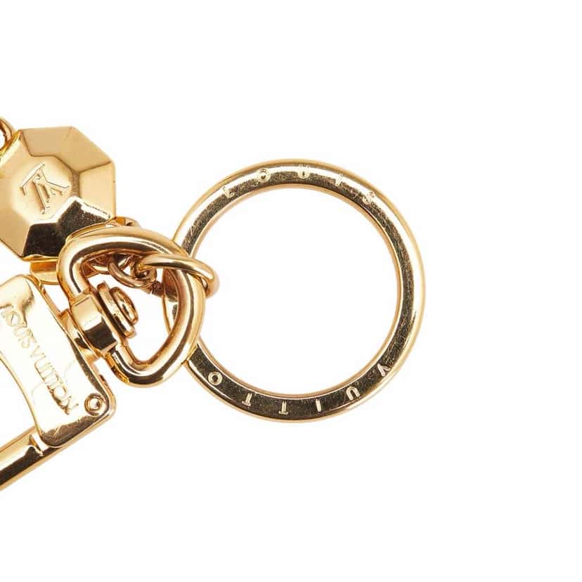 Louis Vuitton Gold Plated LV Facettes Bag Charm and Key Holder Gold Metal Good condition - Box View