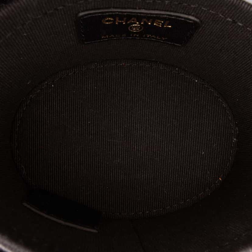 Chanel Mini Quilted Lambskin Round Vanity Case with Chain Black Leather Good condition - Model View