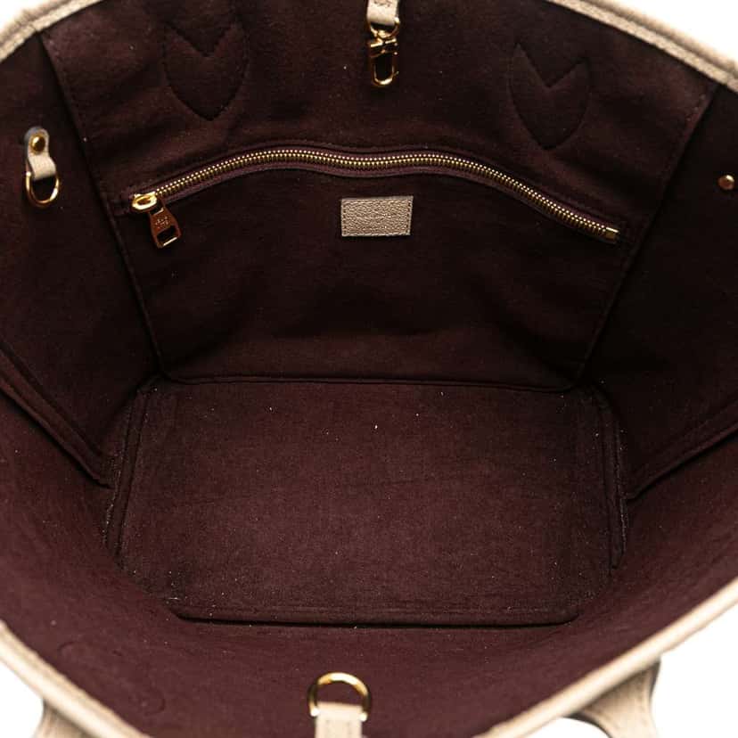 Louis Vuitton Monogram Giant Empreinte Neverfull MM Brown Leather Good condition - Model View