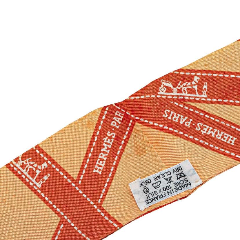 Hermès Bolduc Silk Twilly Scarf Orange Silk Good condition - Model View