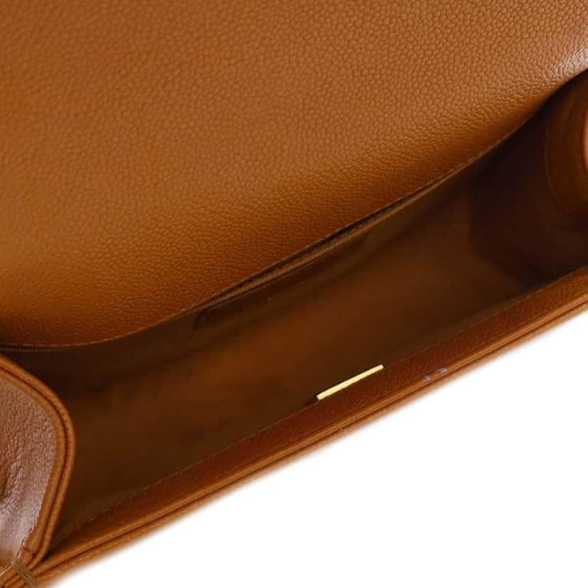 Chanel Small Quilted Caviar Boy Flap Brown Leather Good condition - Model View