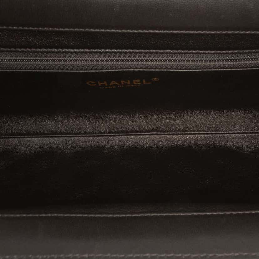Chanel CC Quilted Lambskin Frame Clutch Black Leather Good condition - Model View