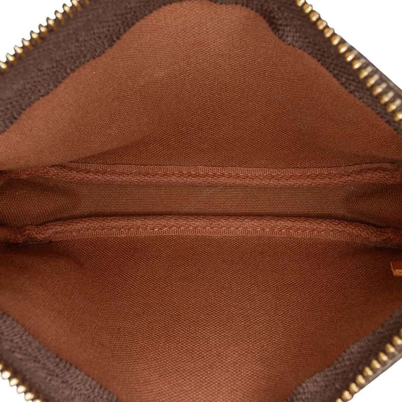 Louis Vuitton Monogram Giraffe Christmas Mini Pochette Accessoires Brown Good condition - Model View